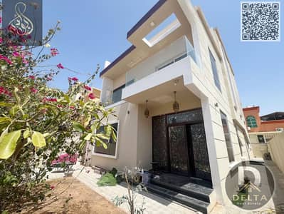 Villa with roof for rent in Ajman, central AC, super deluxe finishing, ready to move in, in a residential area with all services available
