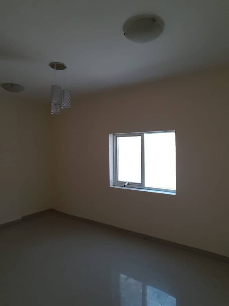 Apartment two rooms and a hall for rent in Ajman Nuaimia 2 King Faisal Street