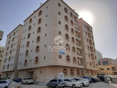 1 Bedroom Flat for Rent in Bu Tina, Sharjah - Spacious Apartment with Split AC - 4 Cheques