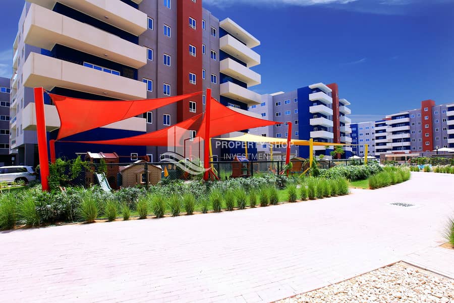 2 abu-dhabi-al-reef-manazel-downtown-community-play-area. JPG