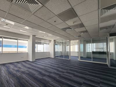 Office for Rent in Sheikh Zayed Road, Dubai - Partitioned office | Close to Metro