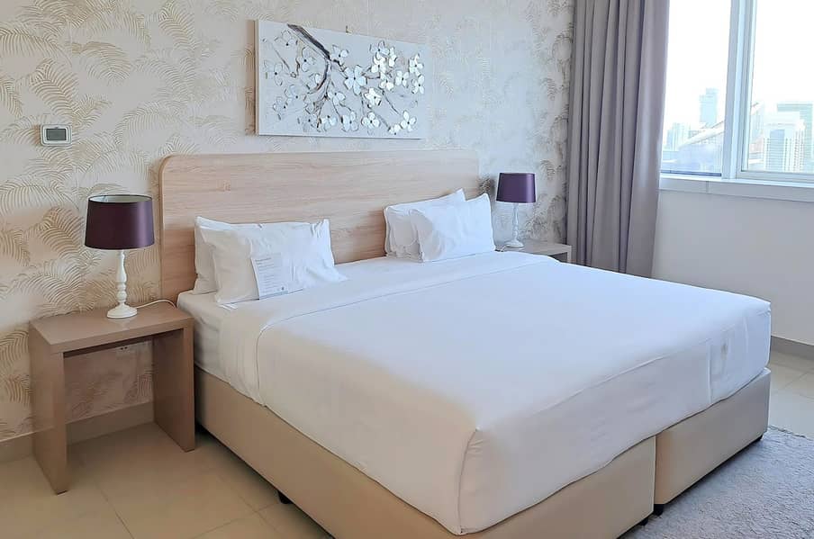 4 One Brdroom Deluxe_Bedroom. jpg