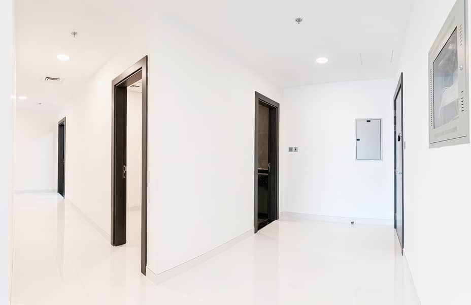 8 AWR Properties Trio 3BR Corridor 1. jpg. jpg