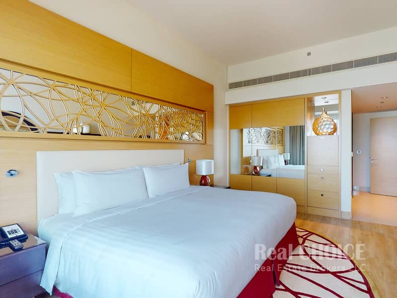 8 MEA AL JADDAF - 1BR - BEDROOM PHOTO 2. jpg