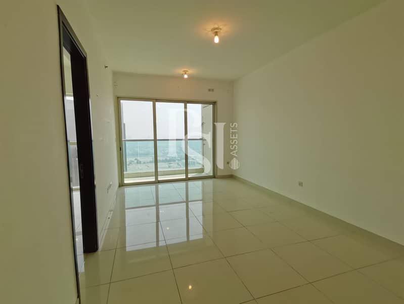 2 1-bedroom-abu-dhabi-al-reem-marina-square-marina-blue-livingroom (1). jpg