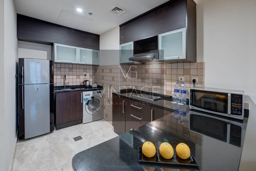 3 Ghaya Grand Hotel Dubai - One Bedroom Kitchen (1). jpg