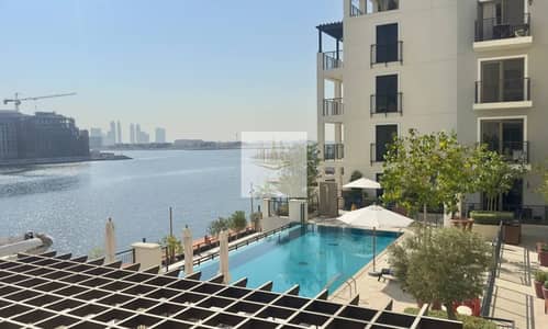 Luxury Waterfront Living | Fully Furnished 1-Bedroom with Stunning Sea & Pool Views