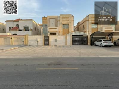 Stone facade villa for sale with electricity, water and air conditioning, area 5000 feet in Ajman, Al Rawda 3 area