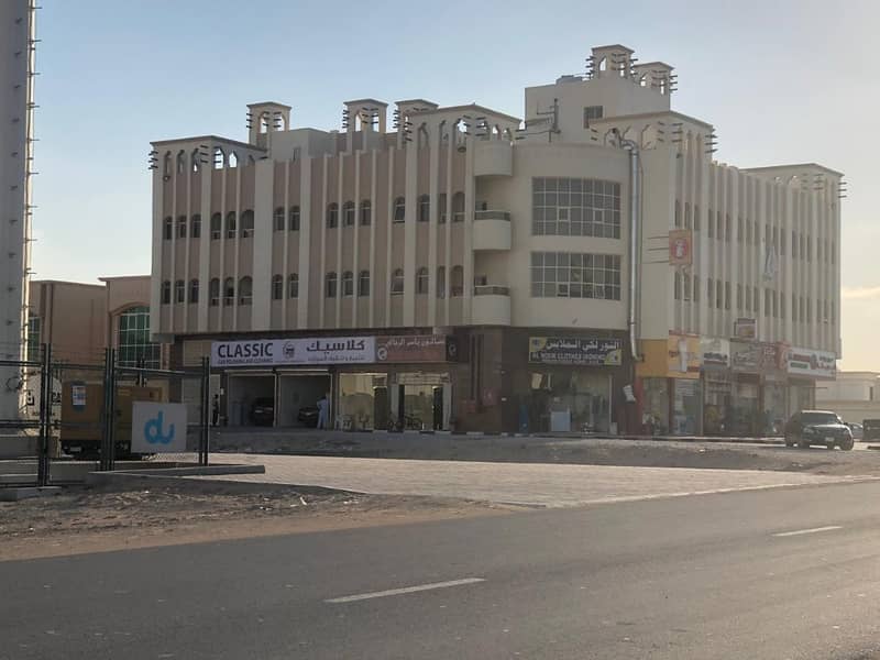 For sale building on the street commercial residential area vital location near the mosque free owne