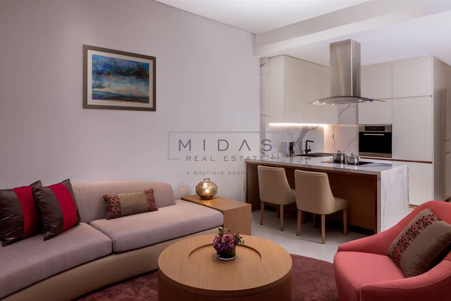 2 One Bedroom Apartment Creek View living room JOCH_008_051223. jpg
