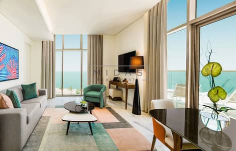 شقة فندقية 1 غرفة نوم للايجار في نخلة جميرا، دبي - Ocean 1 Bedroom Suite Living Room. jpg