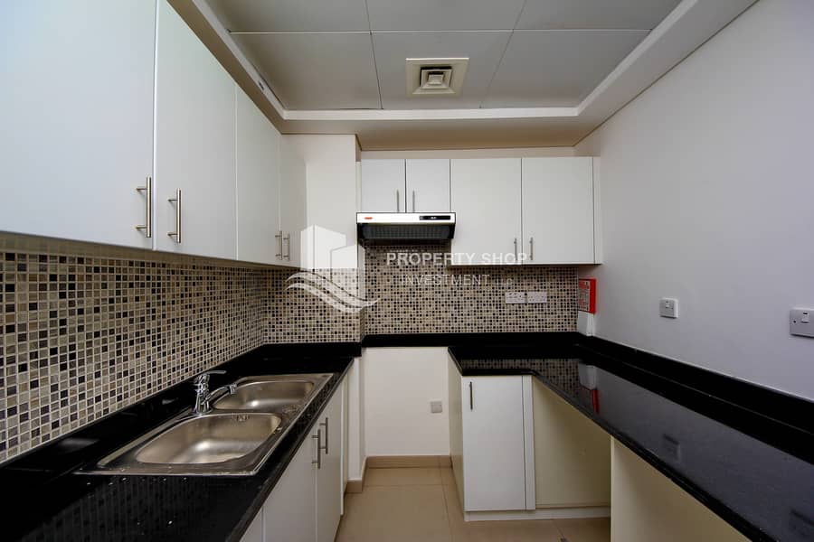 7 1-bedroom-apartment-abu-dhabi-al-ghadeer-waha-kitchen-1. JPG