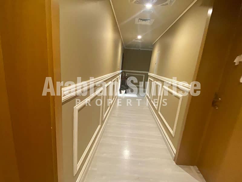 10 Al-Raha-Gardens-5BR-1334-lehweih-Corridor-1. jpg