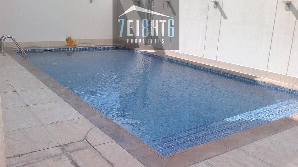 7 4 b/r semi-independent villa with maids room + gym + shared s/pool + landscaped garden + security for rent in Mirdif