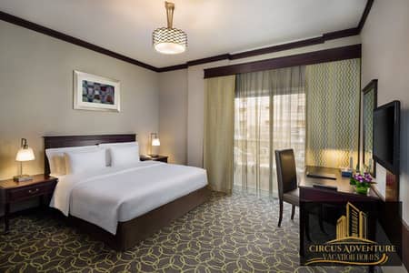 1 Bedroom Hotel Apartment for Rent in Bur Dubai, Dubai - one-bedroom-with-king. jpg
