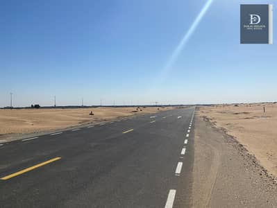 For sale in Sharjah Rawdat Al Qurt area  Residential land  Area 5800 square feet  On a 36-meter road