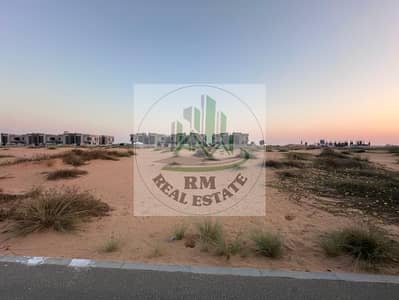 DISTRESS DEAL TOWNHOUSE PLOT FOR SALE  IN UMM AL QUWAIN  ON THE MAIN ROAD