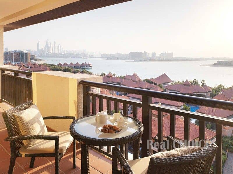8 Anantara_The_Palm_Dubai_Resort_Guest_Room_One_Bedroom_Apartment_Balcony_Palm_View. jpg