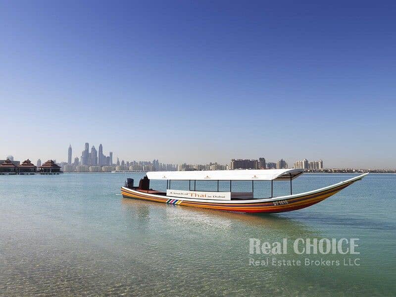 25 Anantara The Palm Dubai Resort - Longtail Boat. jpg