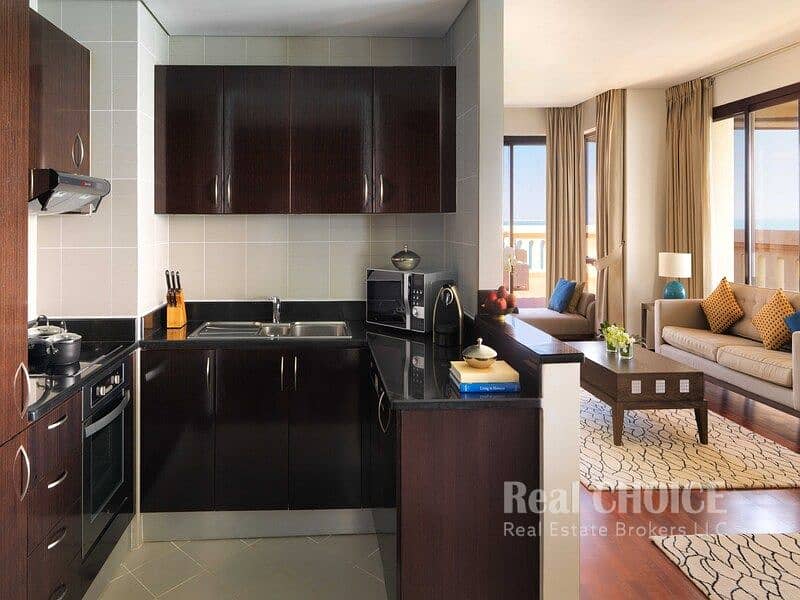 3 Anantara_The_Palm_Dubai_Resort_Guest_Room_ Two_Bedroom_Apartment_with_Luxury_Terrace_Kitchen. jpg