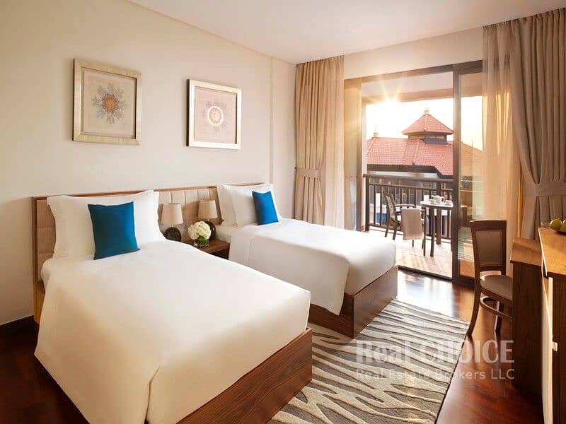 7 Anantara_The_Palm_Dubai_Resort_Guest_Room_Two_Bedroom_Apartment_Bedroom_Twin. jpg