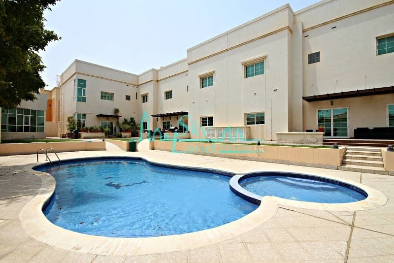 LOVELY 4BR+MAIDS VILLA WITH SHARED POOL IN UMM SUQEIM 1