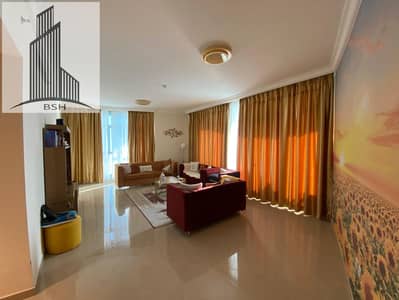 For sale, a luxurious apartment with two rooms and a living room, overlooking the sea and the city, for sale in installments, in the Corniche Residenc