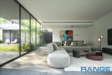 蒂拉尔城， 夏尔迦 3 卧室联排别墅待售 - 5 bedroom living room. png