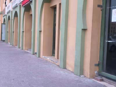 Shop for Rent in International City, Dubai - 1. jpg