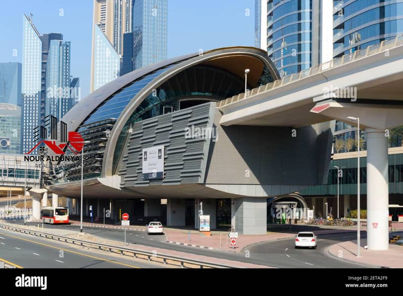 3 dubai-burj-khalifa-and-dubai-mall-metro-station-exterior-view-rail-station-of-rta-dubai-red-line-public-transportation-in-united-arab-emirates-2ETA2F9. jpg