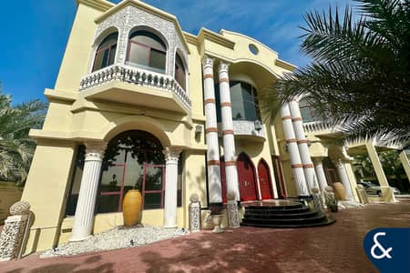 8 Bedroom Villa for Rent in Emirates Hills, Dubai - Grand Entrance | Lake Views | Cinema Room