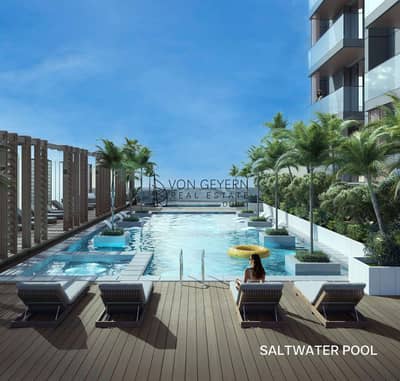 1 Bedroom Apartment for Sale in Jumeirah Village Circle (JVC), Dubai - Von Geyern Real Estate -Q Gardens 2 pool_75137300. jpg