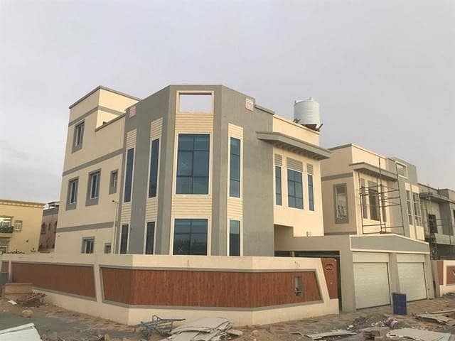 Villa for sale in Ajman Jasmine area close to the road very opposite the garden directly