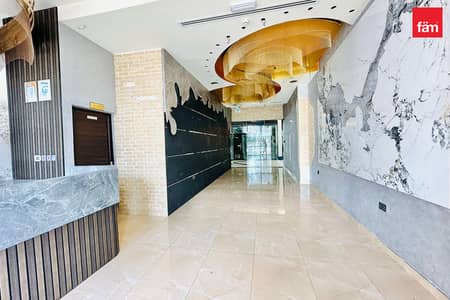 Shop for Rent in Al Hudaiba, Dubai - Retail Space Along Main Road | Fitted