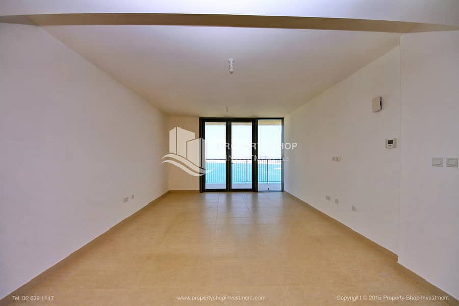 3 1-br-apartment-abu-dhabi-al-raha-beach-al-zeina-tower-a-living-area. JPG