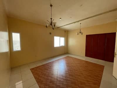 Two-bedroom apartment with a living room, built-in wardrobes, and spacious area for annual rent in Al Qasimia Al Nud - Sharjah.