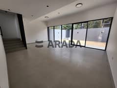 Prestigious Three-bedroom Town house Middle Unit / MASAAR