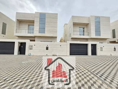 5 Bedroom Villa for Rent in Al Yasmeen, Ajman - Villa for rent in Ajman, Al Yasmine area, European design, large setback, consisting of ground, first, and roof, with a sitting room, hall, kitchen, and five master bedrooms. Price 120