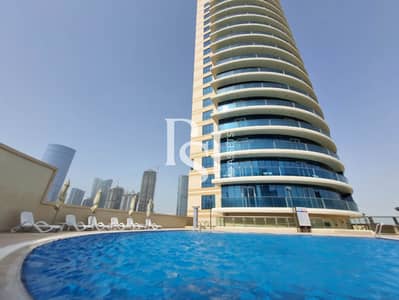 1 Спальня Апартаменты Продажа в Остров Аль Рим, Абу-Даби - julphar-residence-swimming-pool-area (7). JPG