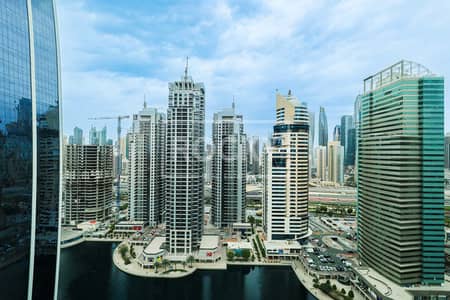 Office for Sale in Jumeirah Lake Towers (JLT), Dubai - VACANT | FITTED | LAKE VIEW | HIGH FLOOR