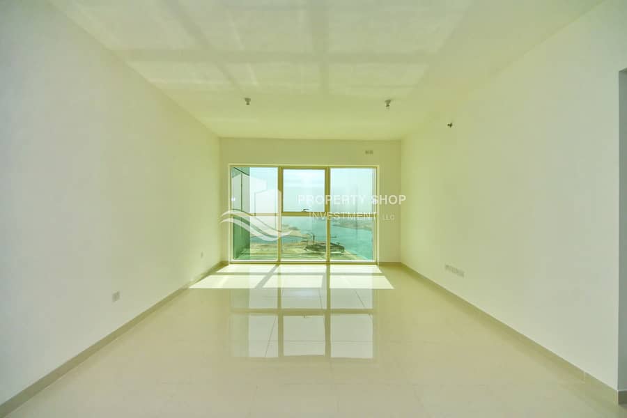 1-bedroom-apartment-al-reem-island-marina-square-marina-blue-living-area. JPG