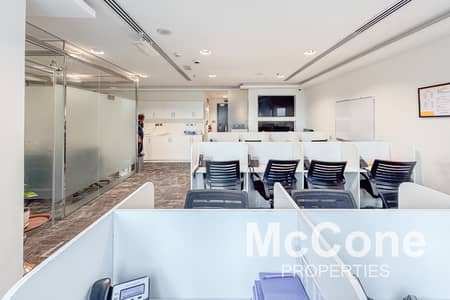 Office for Sale in Business Bay, Dubai - Near Metro | Mid Floor | Partitioned