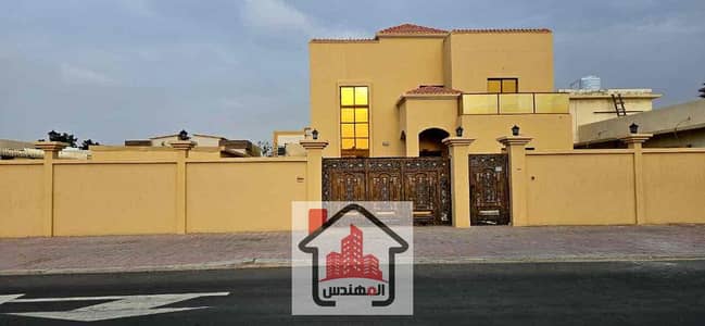 - For rent a villa in Al Muwaihat 2 - Ground floor, first floor and external annex - Land area 6400 feet - Consists of:- - Ground floor: Master bedrooms, hall, sitting room, kitchen and maid's room. - First floor: 4 master bedrooms and a preparatory kitch