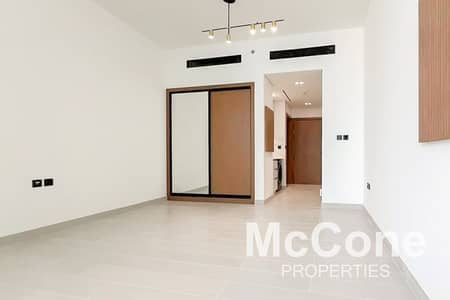 Studio for Rent in Jumeirah Village Circle (JVC), Dubai - Pool Facing | Modern | Brand New