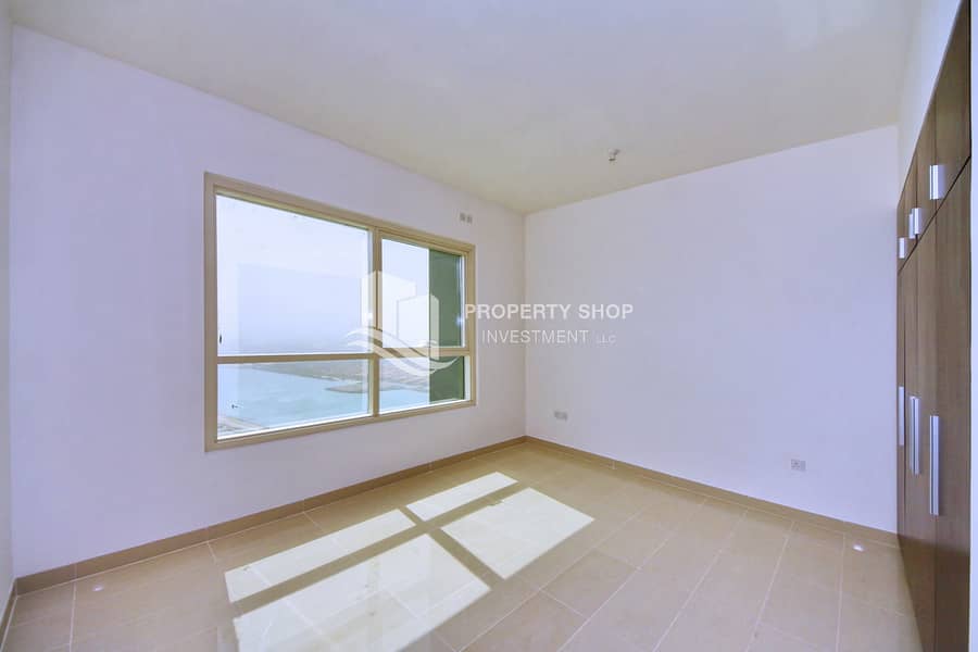 3 1-bedroom-apartment-al-reem-island-marina-square-marina-blue-bedroom. JPG