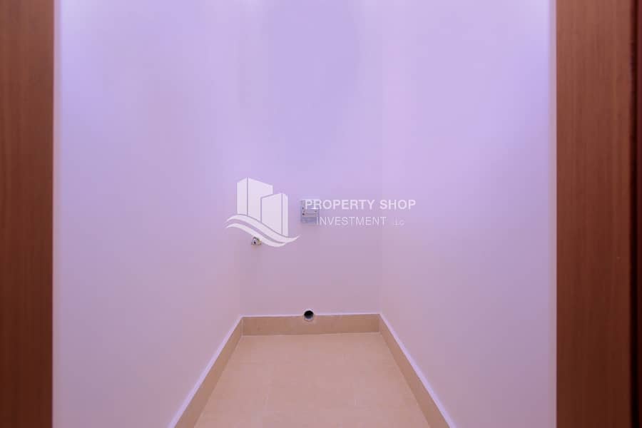 8 1-bedroom-apartment-abu-dhabi-yas-island-ansam-tower-3-laundry-area. JPG