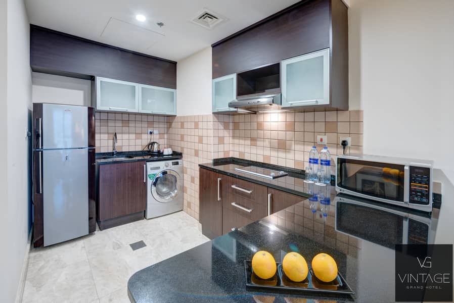 7 Ghaya Grand Hotel Dubai  - One Bedroom Kitchen. jpg