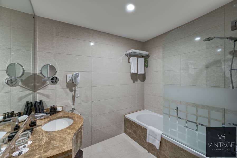 2 Ghaya Grand Hotel Dubai - Two Bedroom Bathroom 3. jpg