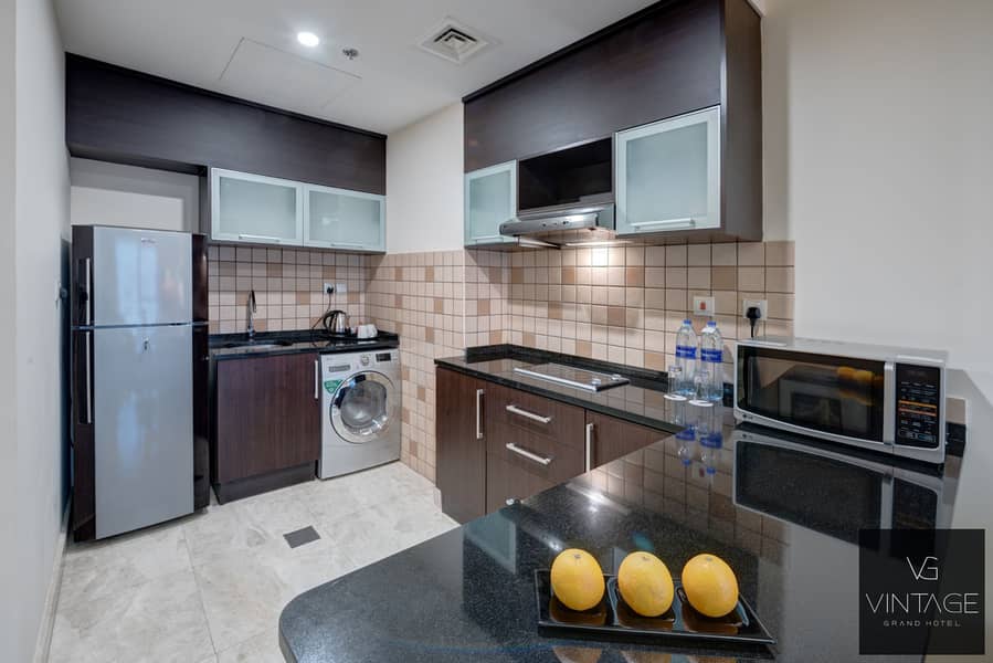 3 Ghaya Grand Hotel Dubai - One Bedroom Kitchen (1). jpg