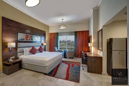 Hotel Apartment for Rent in Dubai Production City (IMPZ), Dubai - Ghaya Grand Hotel Dubai - Studio 1. jpg
